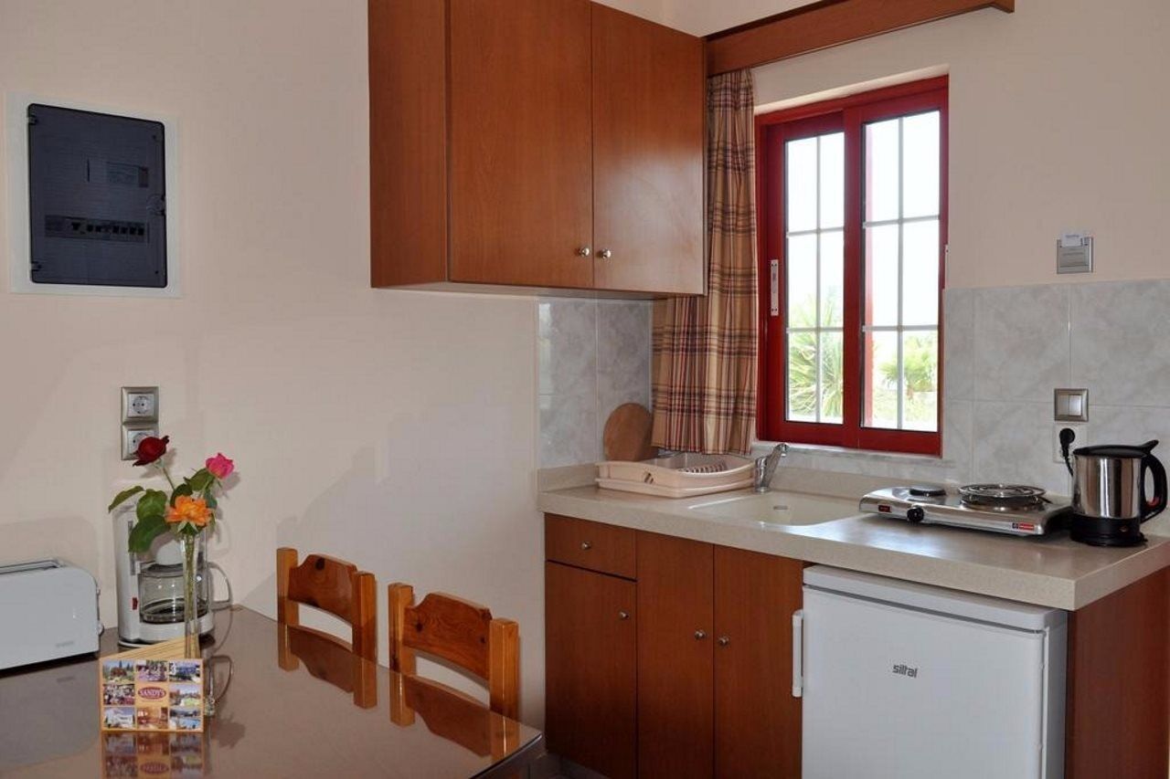 פסאלידי Sandys Studios Apartments And Log Villas מראה חיצוני תמונה